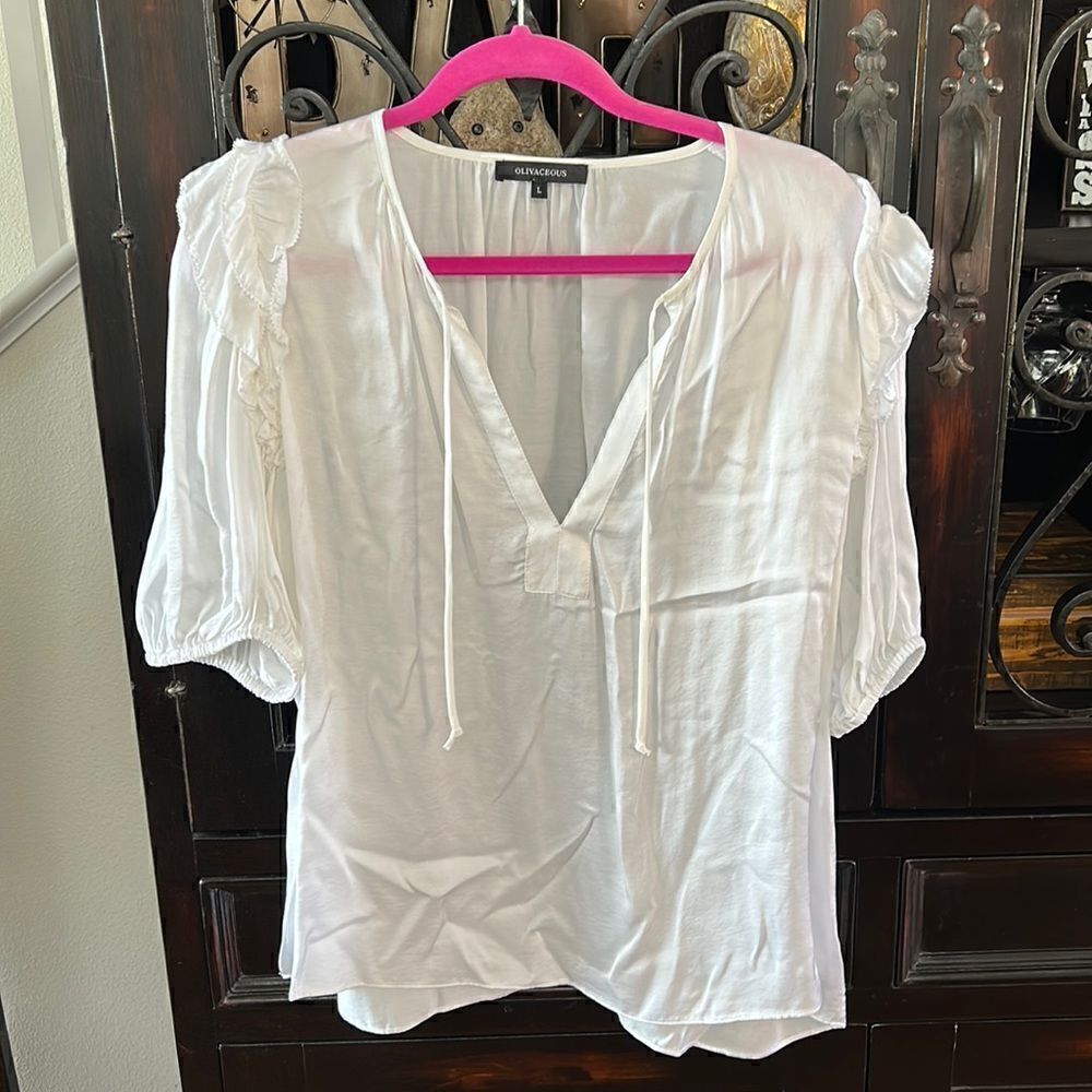 Brand new ruffled short sleeve blouse